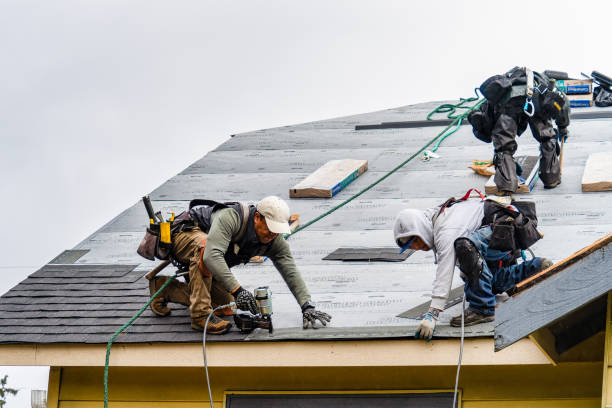 Professional Roofing technician working in Glenville, CT